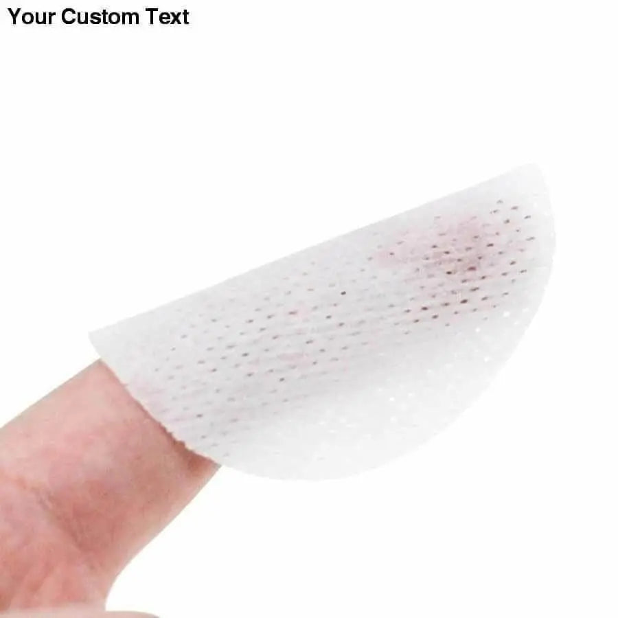Pet Round White Tears Stain Wipes shown on finger demonstrating soft textured cleaning pad for pet eye care