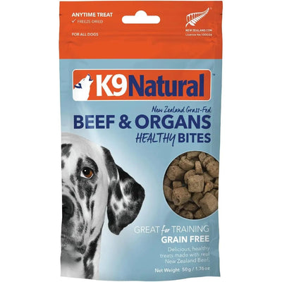 A bag of K9 Natural Healthy Bites Beef & Organs Freeze-Dried Dog Treats 1.76oz, showing a Dalmatian, key product details, and images of the grain-free treats on the front. Brand: K9 Natural.